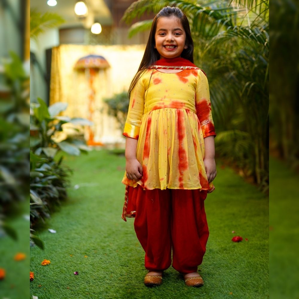 Yellow & Red Shibori print peplum kurta and dhoti pant set